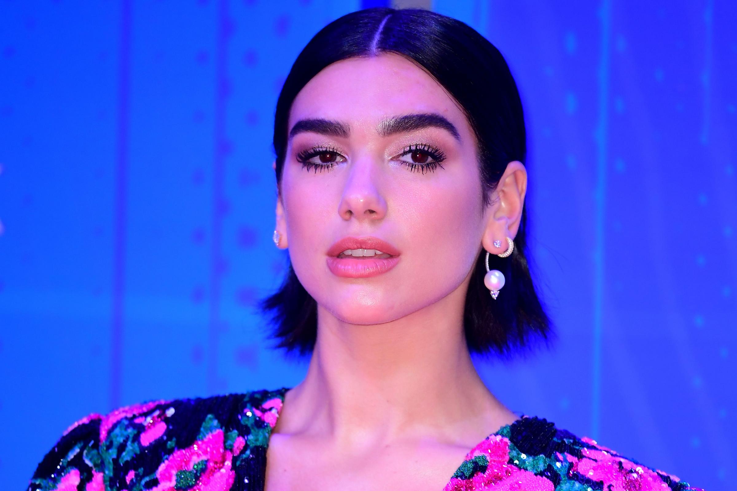 Dua Lipa Nods To Amy Winehouse On The Brit Awards Red Carpet London News Time